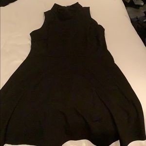 sleeveless mock neck dress.comfortable flattering